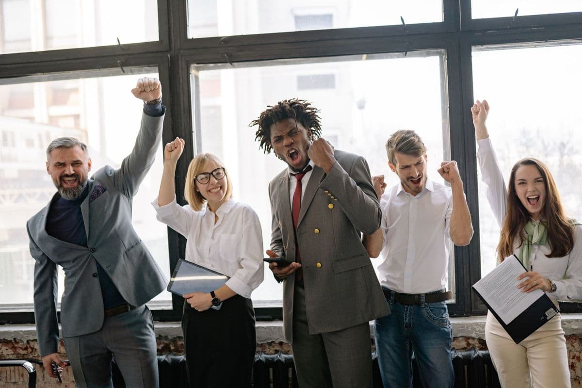 Colleagues celebrating in an office