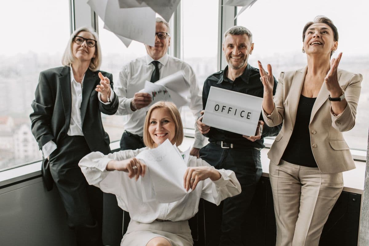 A team celebrating together at work
